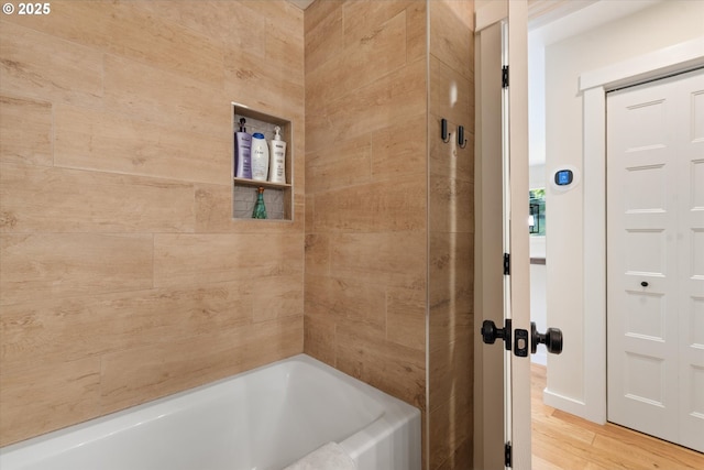 99 Walnut St, La Grande, OR 97850 - bathroom with wood finished floors and shower / bathtub combination