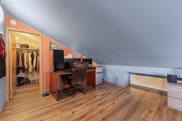 601 N Tomahawk Island Dr, Portland, OR 97217 - office with baseboards, wood finished floors, and lofted ceiling