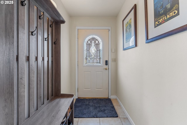 601 N Tomahawk Island Dr, Portland, OR 97217 - mudroom featuring light tile patterned floors and baseboards