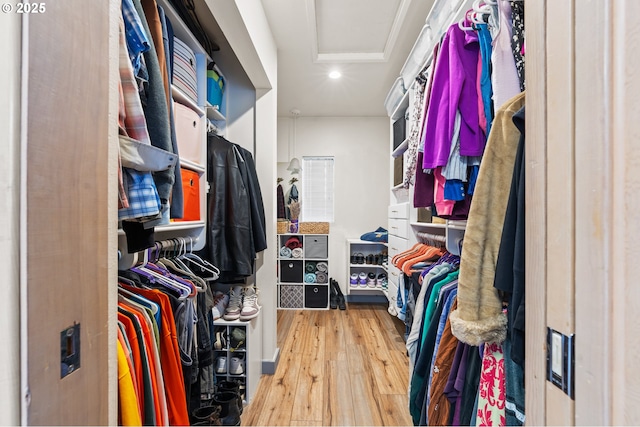 601 N Tomahawk Island Dr, Portland, OR 97217 - walk in closet featuring attic access and wood-type flooring
