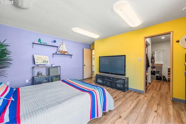 601 N Tomahawk Island Dr, Portland, OR 97217 - bedroom featuring baseboards and wood finished floors