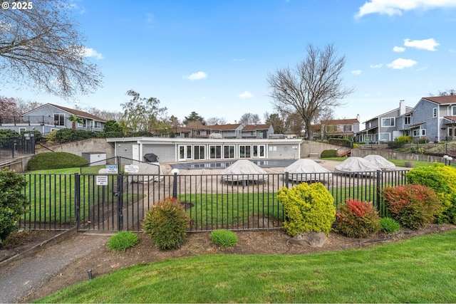 601 N Tomahawk Island Dr, Portland, OR 97217 - back of house with a yard, fence, and a residential view