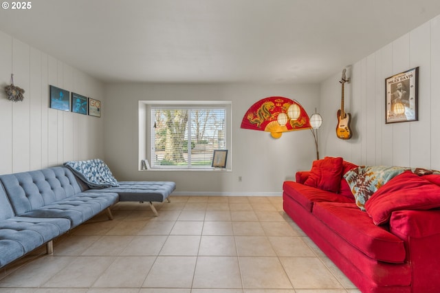 601 N Tomahawk Island Dr, Portland, OR 97217 - living room featuring light tile patterned flooring, baseboards, and wooden walls