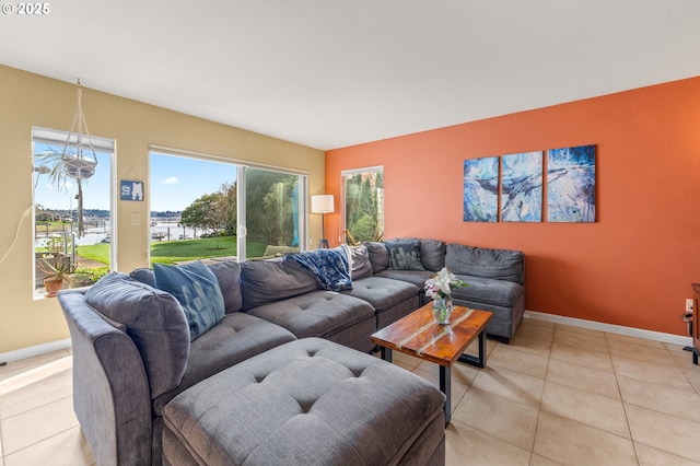 601 N Tomahawk Island Dr, Portland, OR 97217 - living area featuring light tile patterned floors and baseboards