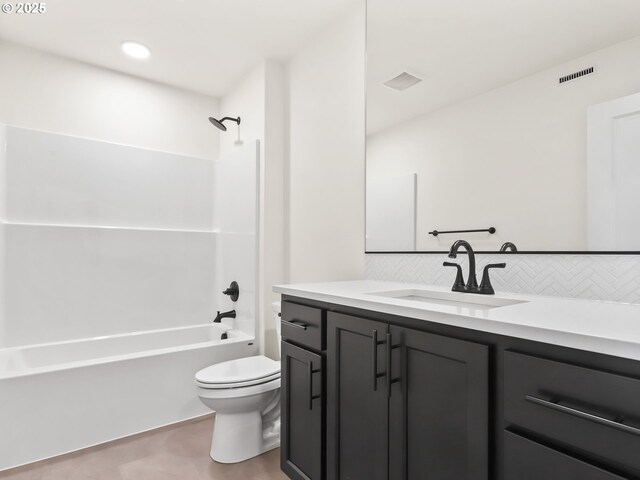 bathroom featuring visible vents, vanity, toilet, tasteful backsplash, and  shower combination