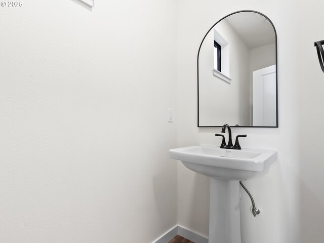 bathroom featuring baseboards