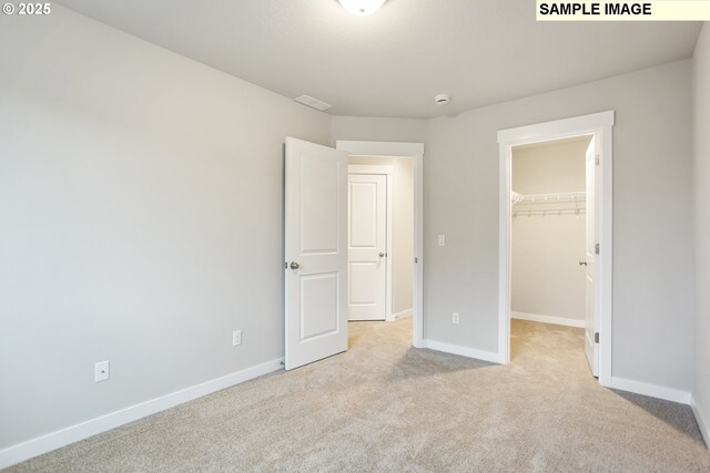 full bathroom with a sink, toilet, and a shower stall