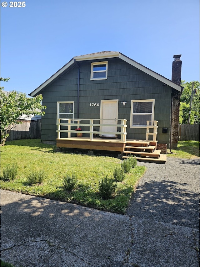 1760 W Broadway, Eugene, OR 97402 - back of house with a deck and a chimney