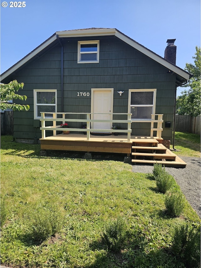 1760 W Broadway, Eugene, OR 97402 - rear view of house with a deck and a chimney
