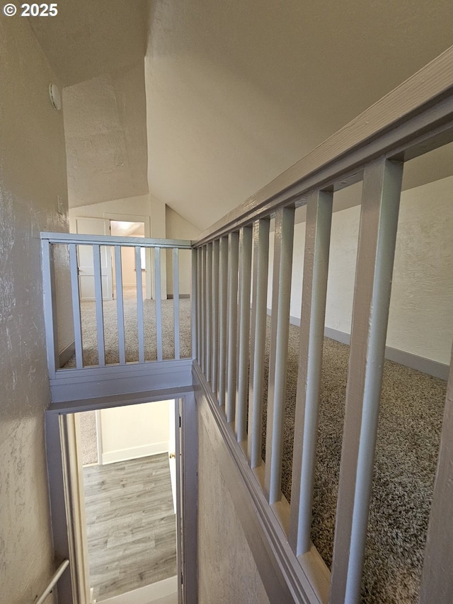 1760 W Broadway, Eugene, OR 97402 - staircase featuring vaulted ceiling and a textured wall