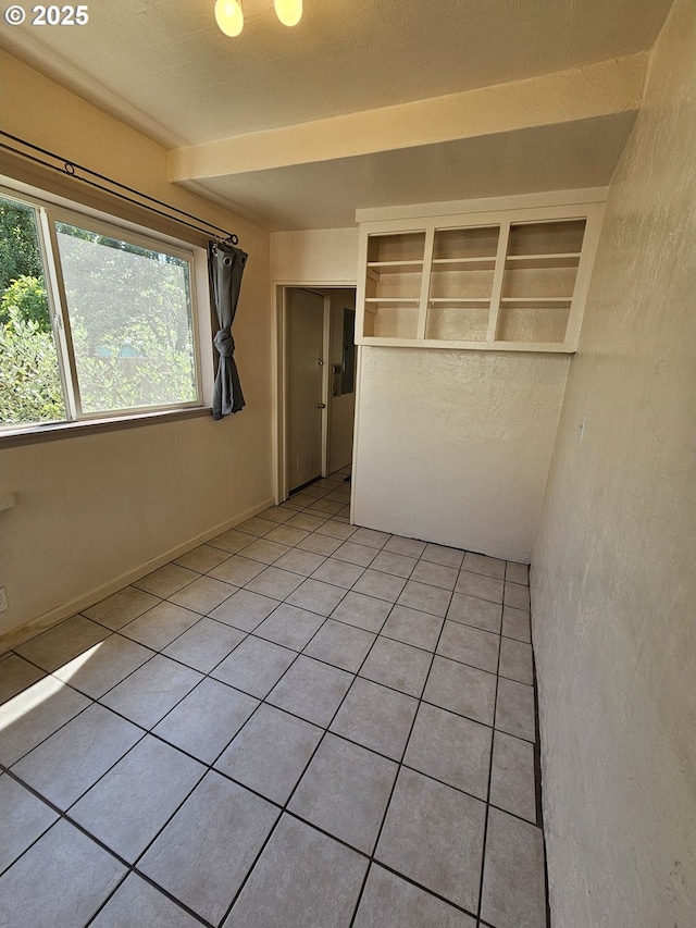 1760 W Broadway, Eugene, OR 97402 - empty room with light tile patterned floors