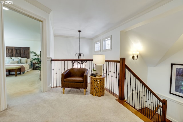 4054 Canal Woods Ct, Lake Oswego, OR 97034 - sitting room featuring a chandelier, carpet flooring, an upstairs landing, and crown molding