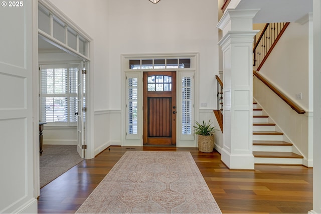 4054 Canal Woods Ct, Lake Oswego, OR 97034 - entryway featuring plenty of natural light, a high ceiling, dark wood-type flooring, and stairway