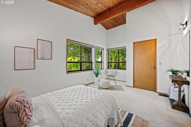 bedroom with beam ceiling, wood ceiling, carpet flooring, high vaulted ceiling, and baseboards