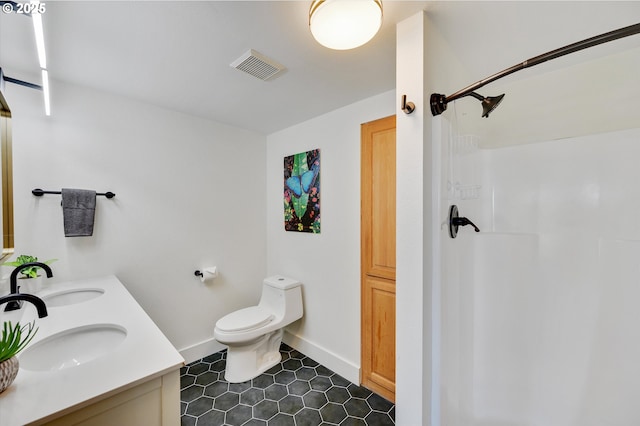 full bathroom with toilet, visible vents, a shower, and a sink