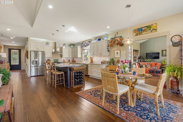 dining room featuring recessed lighting, visible vents, and dark wood-style floors