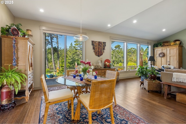 dining area featuring a wealth of natural light, hardwood / wood-style floors, and recessed lighting