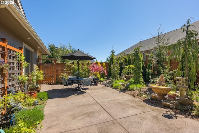 view of patio / terrace featuring outdoor dining area and a fenced backyard