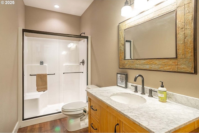25815 NE Lucia Falls Rd, Yacolt, WA 98675 - full bath with a shower stall, wood finished floors, and vanity
