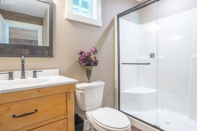 25815 NE Lucia Falls Rd, Yacolt, WA 98675 - full bathroom featuring a shower stall, vanity, and a textured wall