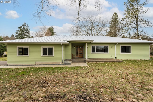 single story home featuring a front yard