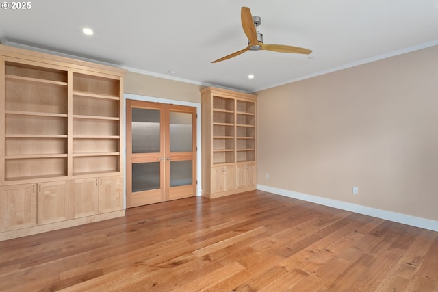 unfurnished living room featuring light wood-style flooring, baseboards, ceiling fan, and crown molding