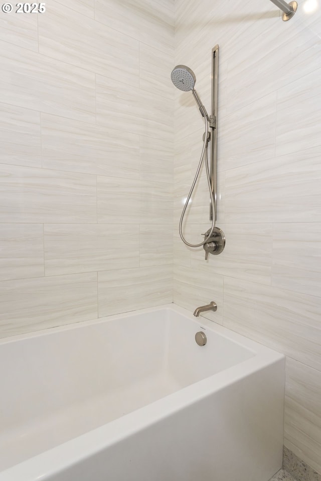 bathroom featuring  shower combination