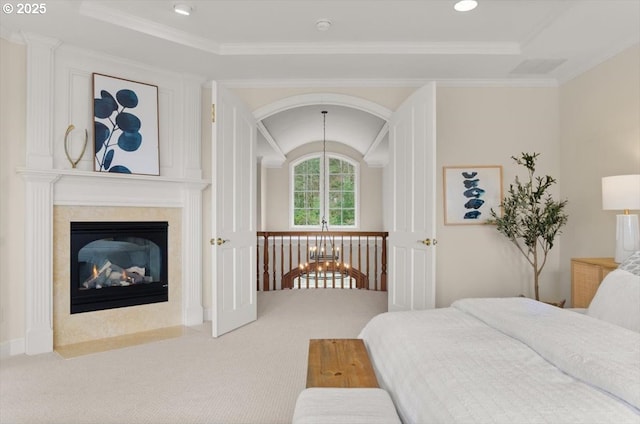 bedroom with multiple windows, carpet floors, recessed lighting, crown molding, and a raised ceiling