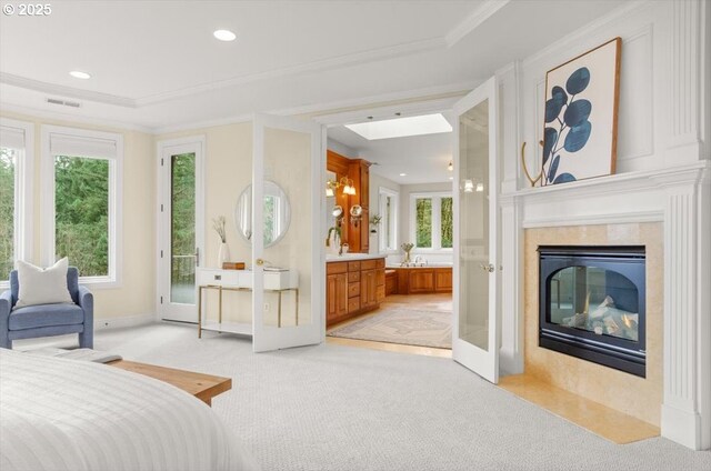 bathroom with a garden tub, double vanity, a chandelier, tile patterned flooring, and recessed lighting