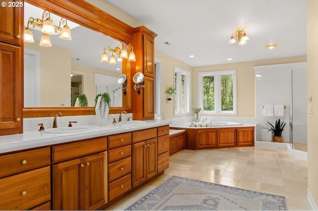 9440 NW Lightning Ridge Dr, Portland, OR 97229 - bathroom with double vanity, a bath, a chandelier, recessed lighting, and tile patterned floors