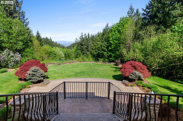 9440 NW Lightning Ridge Dr, Portland, OR 97229 - view of patio / terrace with a wooded view
