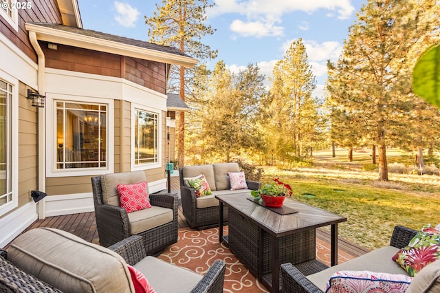 view of patio with outdoor lounge area and a wooden deck