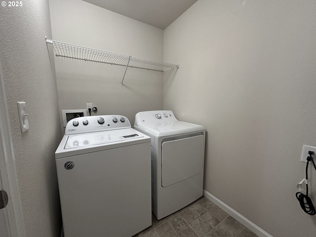 12958 SE 156th Ave, Happy Valley, OR 97086 - laundry area with washing machine and dryer and baseboards