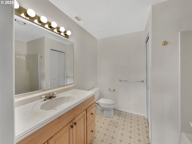 full bath with tile patterned floors, visible vents, toilet, vanity, and walk in shower