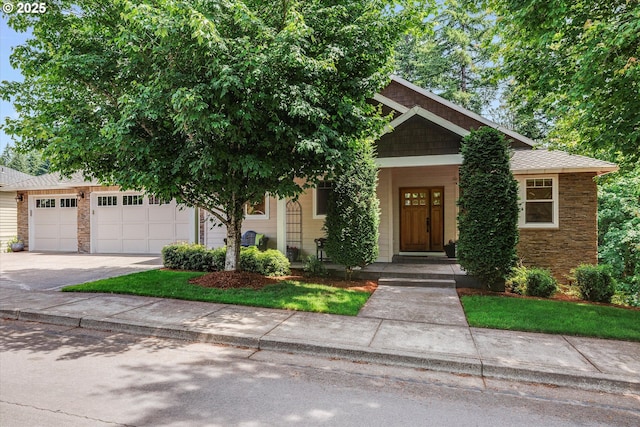 3544 SE Deer Creek Way, Gresham, OR 97080 - view of front of property featuring driveway, a porch, and a garage