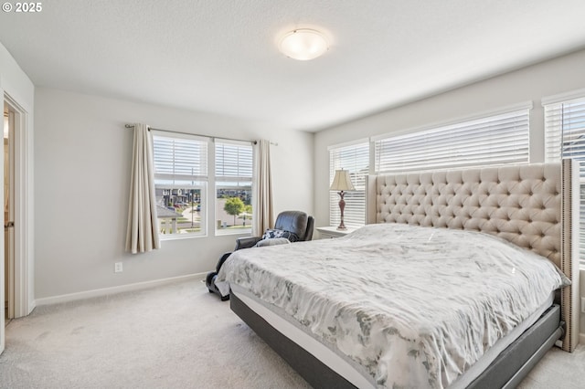 7623 SE Roaring Ln, Hillsboro, OR 97123 - bedroom with light carpet and baseboards