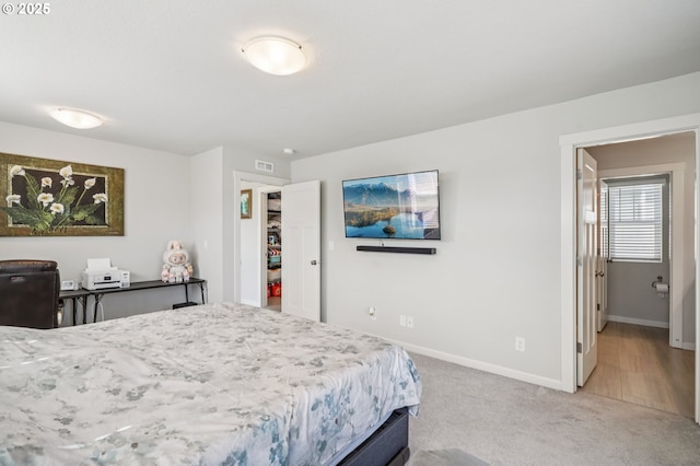 7623 SE Roaring Ln, Hillsboro, OR 97123 - bedroom featuring baseboards and light colored carpet