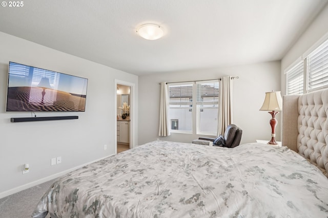 7623 SE Roaring Ln, Hillsboro, OR 97123 - carpeted bedroom with baseboards and ensuite bath