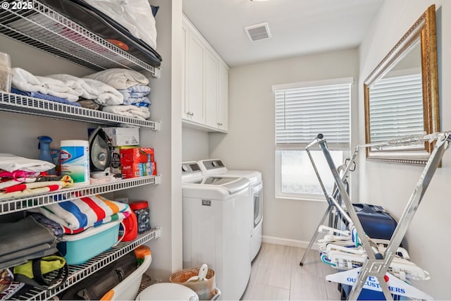 7623 SE Roaring Ln, Hillsboro, OR 97123 - washroom with washer and clothes dryer and cabinet space
