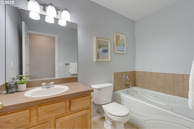 bathroom featuring a bathing tub, vanity, and toilet