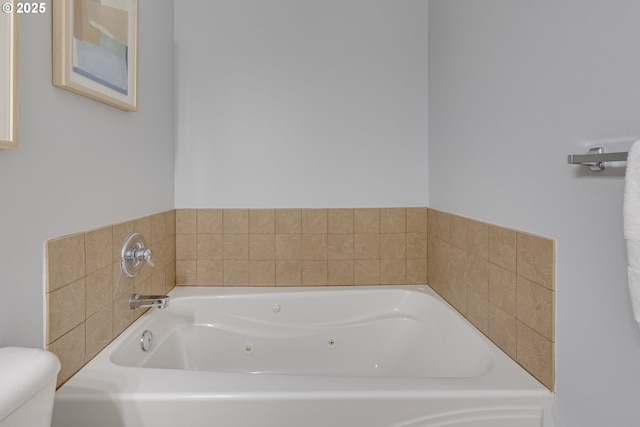 bathroom with a bathtub and toilet