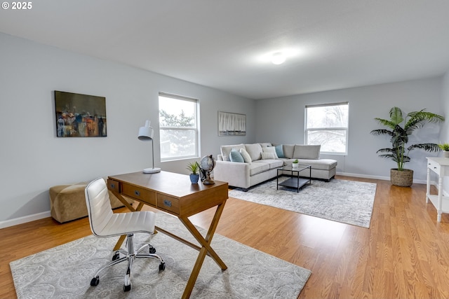 home office featuring light wood-type flooring