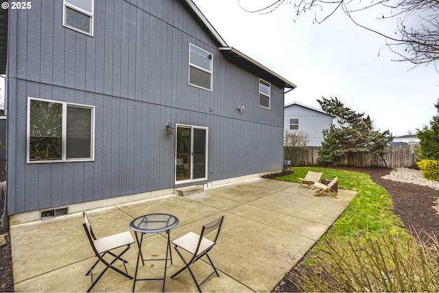 rear view of house with a patio