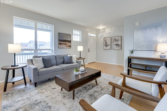 living room with light hardwood / wood-style floors