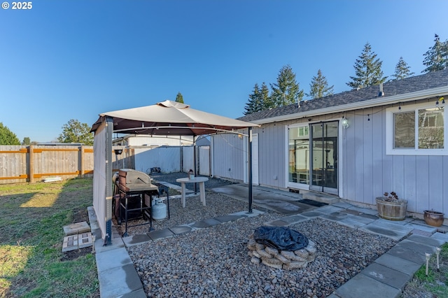 exterior space featuring a gazebo and grilling area