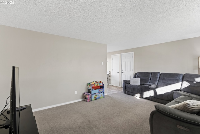 carpeted living room with a textured ceiling