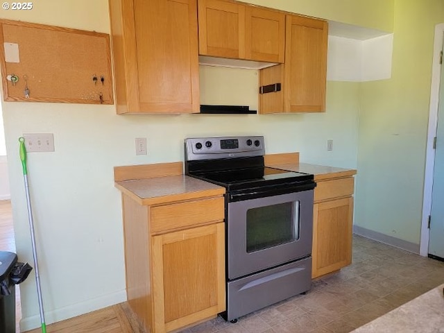 kitchen featuring stainless steel electric range