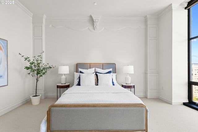 bedroom with baseboards, light carpet, and ornamental molding