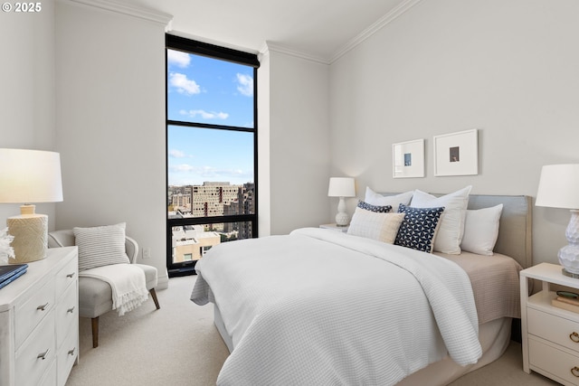 bedroom featuring crown molding, floor to ceiling windows, light carpet, and multiple windows