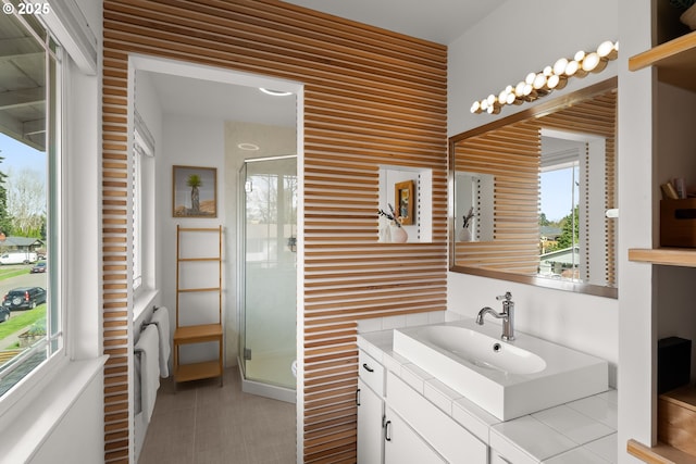3730 NW 183rd Ave, Portland, OR 97229 - bathroom with vanity, a shower stall, plenty of natural light, and tile patterned flooring